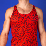 muscular man wearing a red gym tank with a zig zag pattern